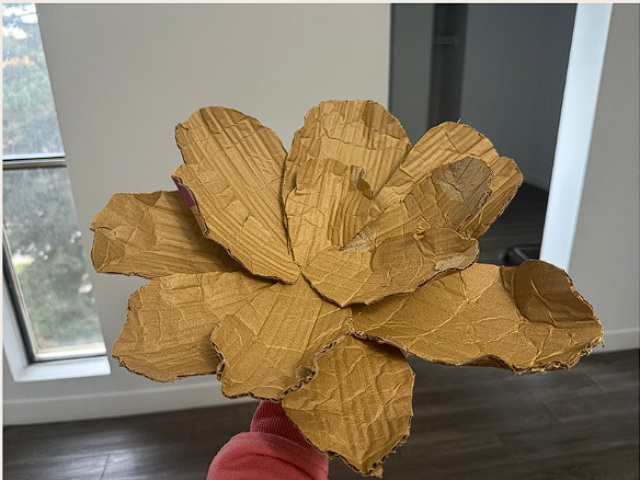 glue the petal and determine the size of the flower to hide the components inside.